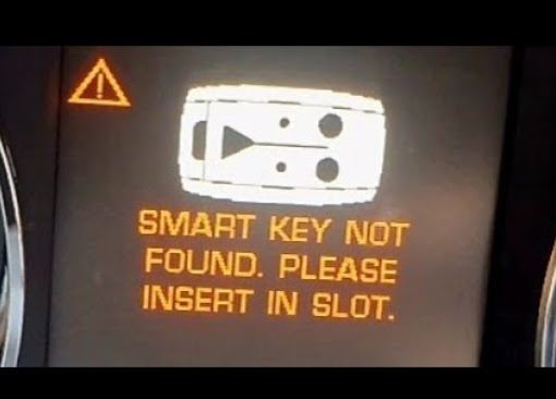 Jaguar XF dashboard display showing the message Smart Key Not Found. Please insert in slot.